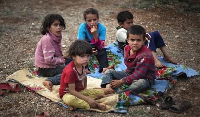 Bambini siriani rifugiati in Turchia (Foto: AP Photo/Khalil Hamra)