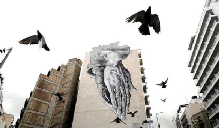 In Grecia gli artisti in strada raccontano la storia del popolo