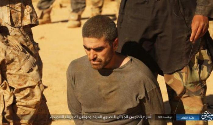 0004F849-il-boia-dell-isis-si-prepara-ad-uccidere Il boia dell'Isis si prepara ad uccidere