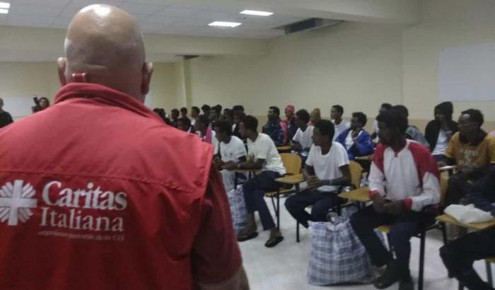 Migranti assistiti dalla Caritas