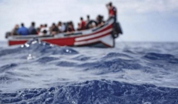 00053E4C-migranti Migranti