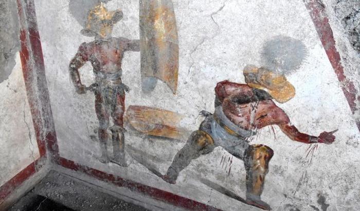 000541A9-l-affresco-dei-gladiatori-scoperti-a-pompei-foto-parco-archeologico-di-pompei L’affresco dei gladiatori scoperti a Pompei. Foto: Parco archeologico di Pompei