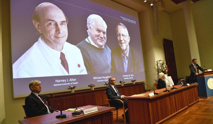 000580E2-il-britannico-michael-houghton-e-agli-americani-harvey-alter-e-charles-rice Il britannico Michael Houghton e agli americani Harvey Alter e Charles Rice